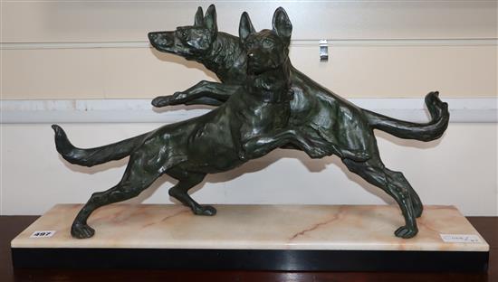 An Art Deco spelter group of a pair of dogs, on marble base, length 65cm